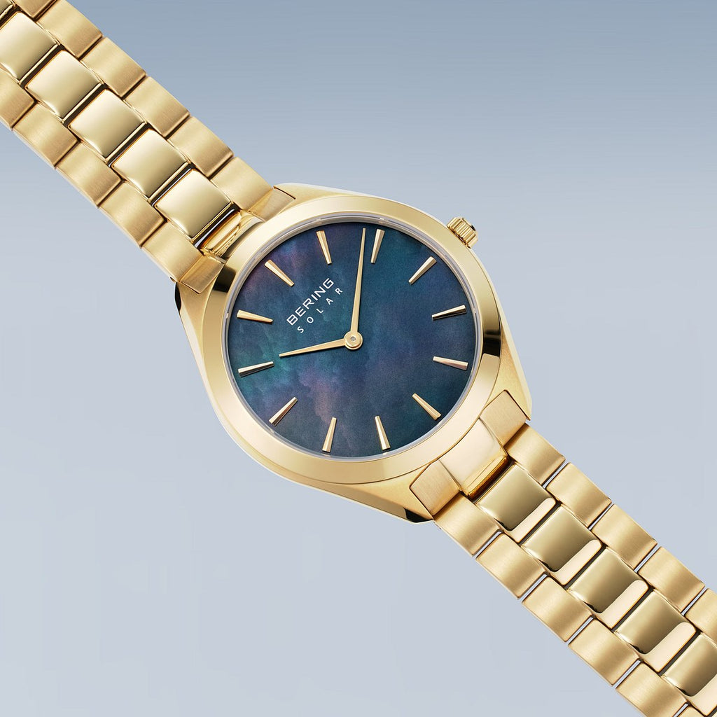 Bering Damenuhr 17331-732 Solar Gold Edelstahl Perlmutt Blau Grün