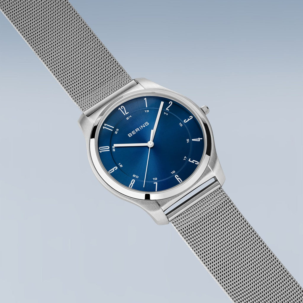 Bering Herrenuhr 18340-307 Titan Silber Blau Mesh elegant