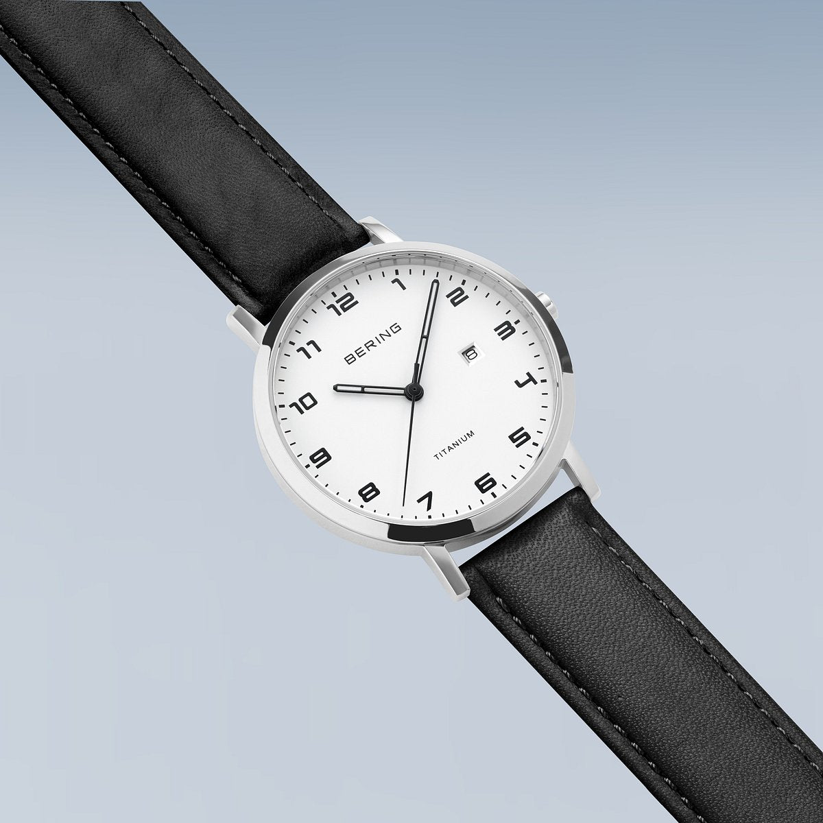 Bering Herrenuhr 18634-404 Titan Leder Schwarz Weiß ultraleicht