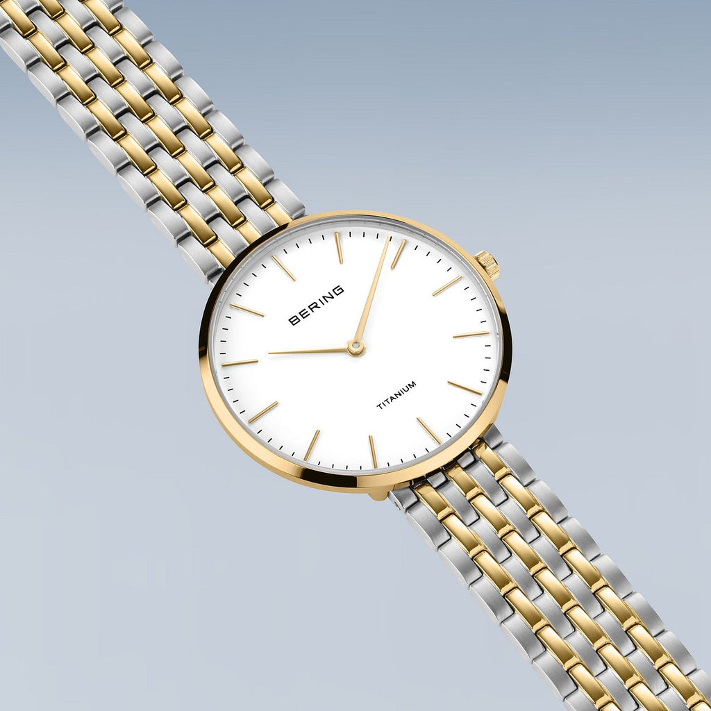 Bering Damenuhr 19334-010 Titan Bicolor Gold Silber elegant