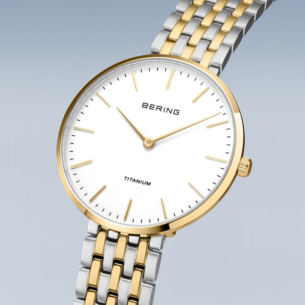 Bering Damenuhr 19334-010 Titan Bicolor Gold Silber elegant