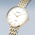 Bering Damenuhr 19334-010 Titan Bicolor Gold Silber elegant