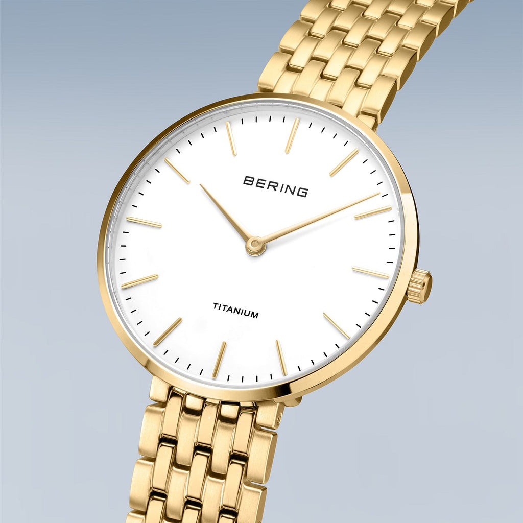 Bering Damenuhr 19334-334 Titan Gold Weiß ultraflach elegant